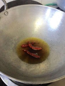 Drop Dried Red Chillies In Olive Oil