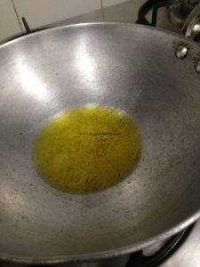 Add The Ghee To The Wok